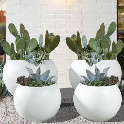 China Nordic Modern Matte Black Small Vase Round Ball Flower Pot Tabletop Flower Pot For Minimalist Elegant Home Decor for sale