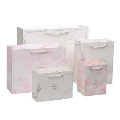 China Recycled Materials Spot Handbag Marble Shipping Paper Bag Clothing Gift Square Shape Paper Bag High Quality for sale