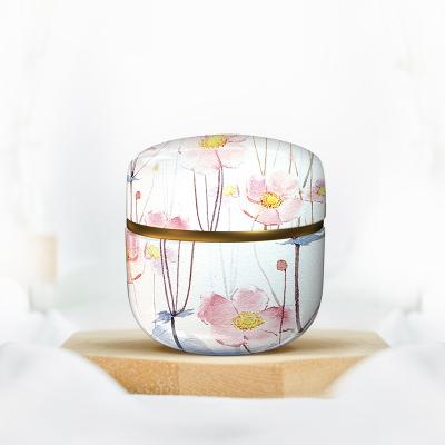 China Recycled Materials Wholesale Luxury Tea Tins Empty Metal Tea Canister For Tea Round Tin Canister Multicolor Tin Box for sale