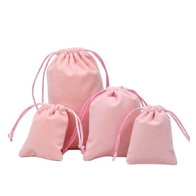 China Soft Pink Short Storage Custom Velvet Drawstring Bags Velvet Jewelry Storage Bag for sale