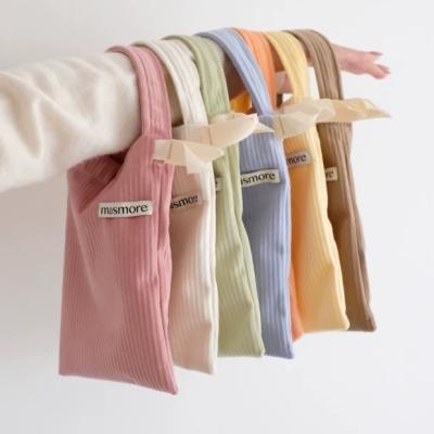 China Small Corduroy Drawstring Tote Bag Mini Corduroy Cloth Storage Bag Soft Material Jewelry Purse For Girls for sale