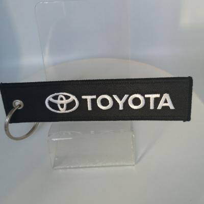 China Sustainable new design hot selling embroidery toyota car keychains for sale