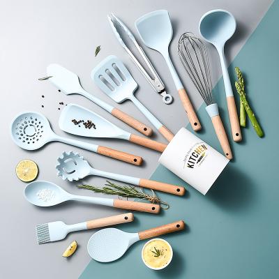 China Sustainable New Product Sky Blue Silicone Kitchen Accessories Silicone Cooking Set with 13pcs Wooden Handle Including Cooking Spoon for sale