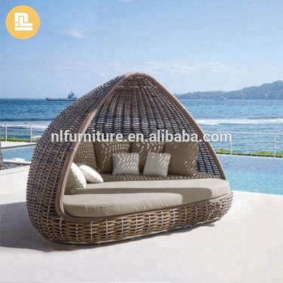 China Cool Outdoor Rattan Garden Style Leisure Sofa Bed Wicker Furniture Set With Comfortable Pillows for sale