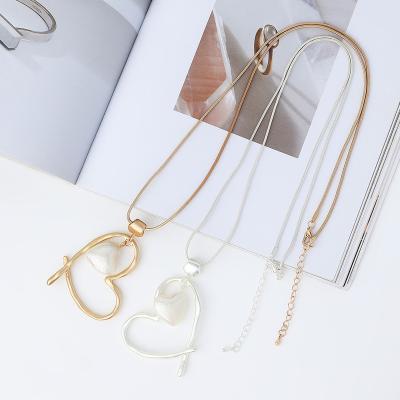 China FASHIONABLE Simple Geometric Snake Hollow Thin Bone Pair Heart Beads Vintage Long Chain Necklace For Women for sale