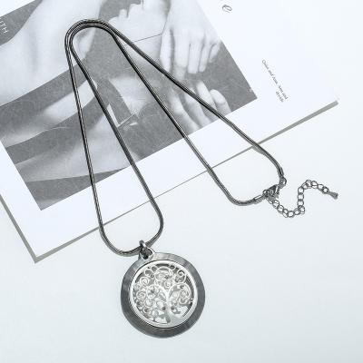 China Fashion Metal Round Geometry Tree Life Tree Two Tone Sweater TRENDY Long Circle Cavity Pendant Crystal Necklaces For Women Jewelry Necklace for sale