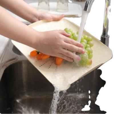 China Kitchen Viable Accessories Plastic Sink Strainer Colander Set Kitchen Fruit Drain Rotating Colander for sale