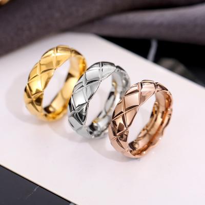 China 2023 CLASSIC High Polished Geometric Mesh Design 18k Fashion Unfading Gold Plated Titanium Steel Wedding Couple Ring for sale