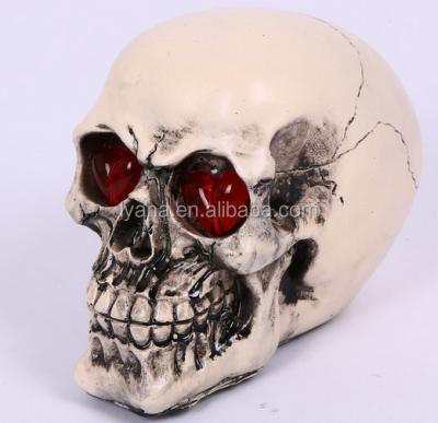 China Europe 2020 Hot Selling Halloween Decoration Creative Ornaments LED Resin Artificial Skulls for sale