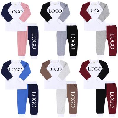 China Custom Cotton Children's Breathable Long Sleeve Pajamas Boys Casual Two Sets Girls Homewear for sale