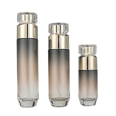 China Personal Care Glass Bottle Cosmetic Set -- Cosmetic Packaging Container Skin Care Bottle Manufacturer-Irregular Gold Cover With Pump&spray for sale