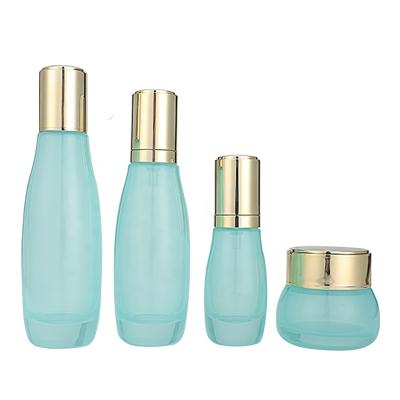 China Cosmetic Container Blue Clear Manufacturer Skin Care Set Personal Care Glass Bottle Cosmetic Packaging for sale