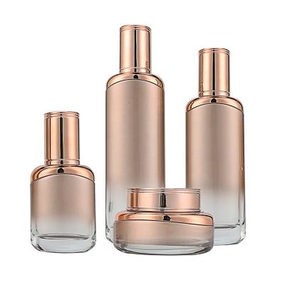 China Personal Care Luxury Cosmetic Glass Packaging Bottle Set Dio* Skin Care Same Style Cosmetic Packaging Container With Shoulder Sleeve for sale