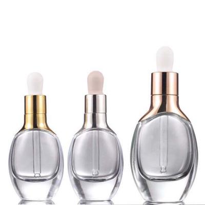 China Personal Care Essential Oil Dropper Glass Bottle Skin Care Cosmetic Serum Glass Packaging Container Luxury Glass Bottle for sale