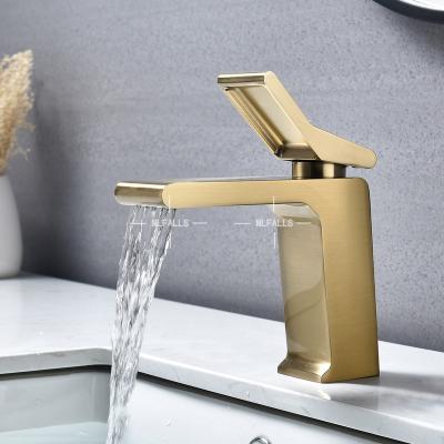 China Contemporary Brushed Luxury Bathroom Sink Single Handle Basin Waterfall Waterfall Gold Hot And Cold Faucet Mixer Tap for sale