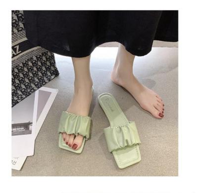 China Cushioning Summer Fashion Flat Wild Slippers Ease Outside Beach Shoes Ladies Slides Women Summer Casual Sandals for sale