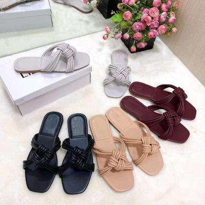 China Scum 2021 knitted flat pattern women's slippers sexy sandals slippers belt tied shoes news knitted flat for sale