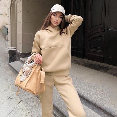 China Solid Color Breathable Hoodies Sheath Long Hooded Women Sweatsuit Set Casual Jogging Suit Waisted Sweatpants Two Piece Set for sale