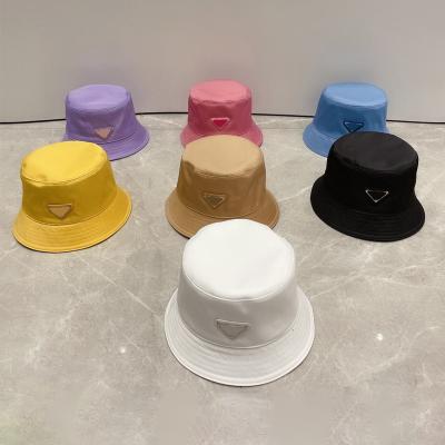 China Famous Cotton Custom Designer Hats Bucket Hat Logo Custom Plush Beanies for sale