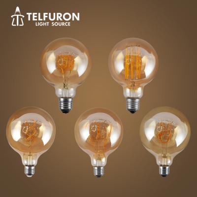 China New Model G80 G95 G125 Amber Clear Glass 4W Indoor Modern Living Room Decoration LED Filament Curly Light Bulbs for sale