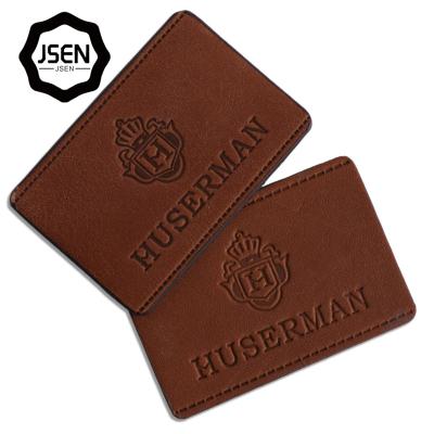 China Free Embossed Letter PU Material Leather Label Silk Printing Logo Design Viable Clothing Trademark Color Change Leather Brand for sale