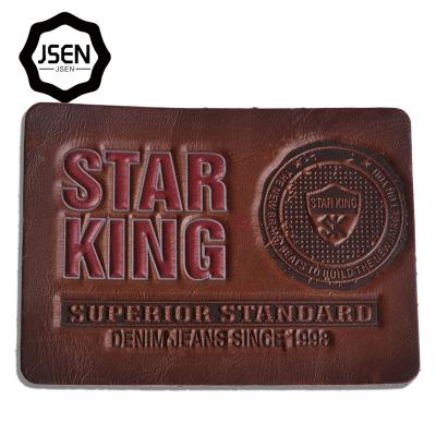 China Fashion Design Sustainable Brand Logo Embossed Label And PU Leatherette Patch For Jeans And Sofa for sale