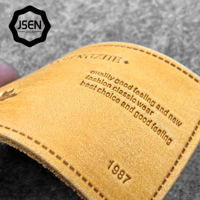 China High Quality Durable Faux Leather Labels Custom Embossed Leather Patch For Jeans , Garment Leather Patch for sale