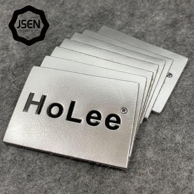 China Durable Custom PU Leather Patch Labels With Metal Logo For Private Label for sale