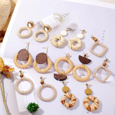 China Retro TRENDY Hemp Rope Rattan Straw Wooden Geometric European and American Handmade Stud Earrings for sale