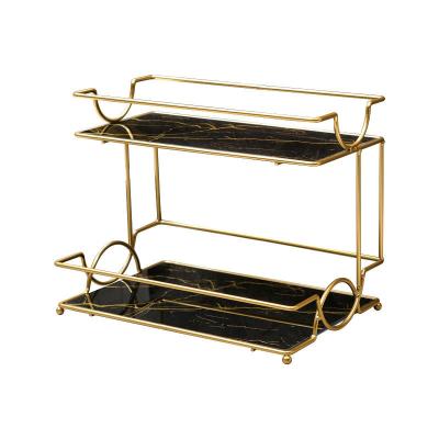 China Modern simple multifunctional ceramic cosmetic bathroom bracket stainless steel metal storage gold plated rack for sale