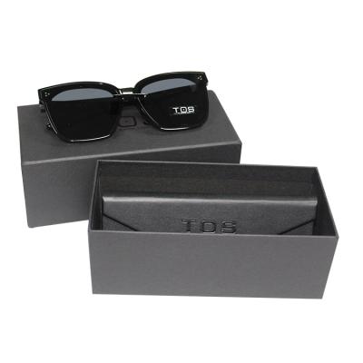 China Recycled Materials Black Matte Luxury Triangle Magnet Cardboard Sunglasses Gift Packaging Paper Folding Storage Box for sale