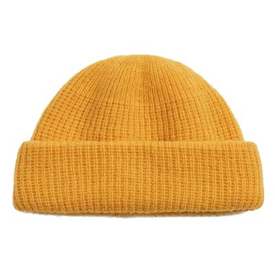 China COMMON Logo Plain Knitted Beanie Cap Winter Beanies Custom Hats for sale