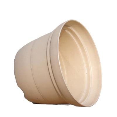 China New durable pp resin flower pot round flower pot with holes at the bottom good air permeability flower pot spray for sale