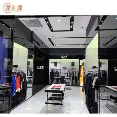 China Hot Sale Fashion Clothing Store Display Table Showcase Manufacturer Clothing Display Rack Shop Decorations Design for sale