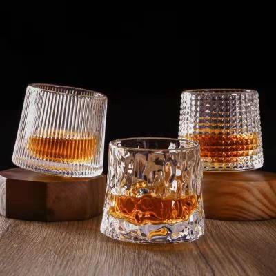 China Viable Wholesale Custom Shaped Crystal Wine Glass Cup Creative Decompression Cup Whiskey Rotary Tumbler Glass for sale