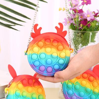 China Newest Cute Pop Silicone Coin Purse Wallet Bag Rainbow Color Wiggle Person Toys Purse For Women Kids for sale