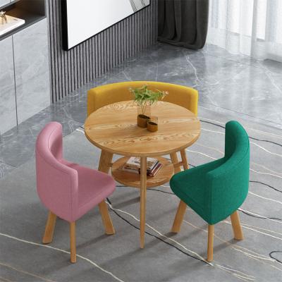 China Modern Simple Stable Living Room Tables And Chairs Set PU Leather Covers Single Chair Canvas Living Room for sale