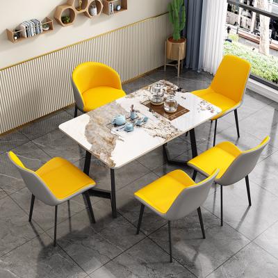 China Sillas Comfortable PU Kitchen High Quality Leather Dining Table And Chair Set Luxury Modern Carbon Steel Legs Cadeiras for sale