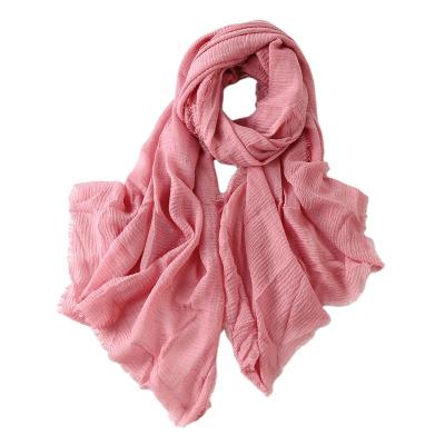 China New Cotton Cotton Hemp Scarf With Wool Fringe Muslim Scarf With Pure Color Pleated Scarf for sale