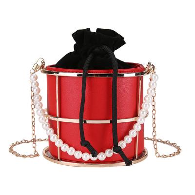 China Fashion One Shoulder Bag Women's Fashion Personality Metal Bucket Bag Pearl Chain Cavity Messenger Bag New for sale