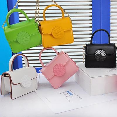 China 2021 Fashion Fashion Candy Color Kids Clips Shoulder Bag For Girls PU Leather Cross - Body Cute Mini Kid Purses Women Handbags And Bags for sale