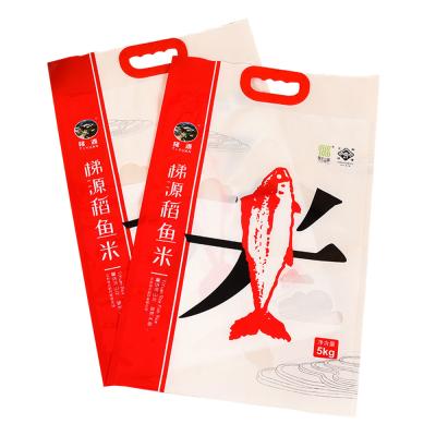 China The new 2021 impact resistance 10KG 15kg weight printing rice plastic moisture proof bag with portable strong handle for sale