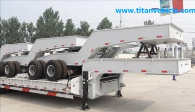 China Titan Lowbed trailer ,4line 8 axle lowbed trailer loading capacity 150tons with 2 line 4 axle dolly for sale