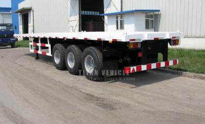 China What is the price on your TITAN 3 axle 40T/60T shipping container transport flatbed semi trailer？ à venda