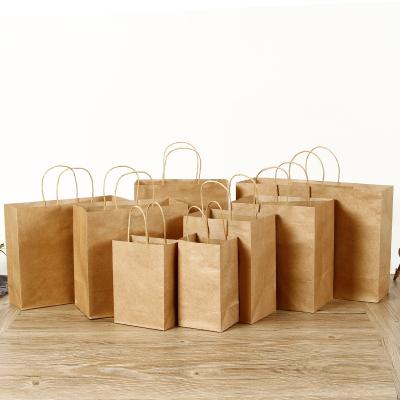 China Wholesale Recycled Materials Factory Kraft Paper Shopping Bags Take Away Personalized Christmas Gift Paper Bags for sale