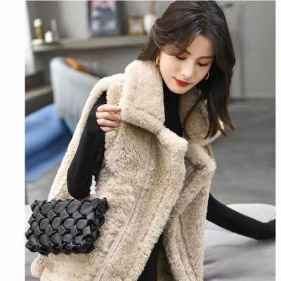 China High-end women's clothing the wear of new spring lamb fur vest outer jacket reversible women's vest for sale