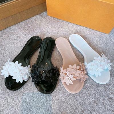 China Fashion Trend Wholesale Customize Sandals Women Shoes Luxury Slipper Outdoor Floral Embellished Patent Slides One Strap Sandal Casual Flat PVC Jelly Slide for sale