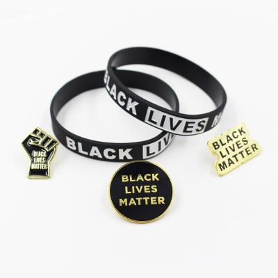 China Hot Amazon World Peace All The Tough Lives Black Pin Badge Silicone Wristbands Sale Enamel Lapel Bracelet Import for sale