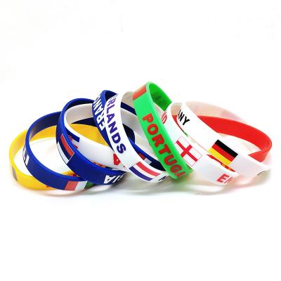 China Custom Eco-Friendly Full-Page Silicone Rubber Bracelet Wrist Band Armband Debossed Souvenir Gift for sale