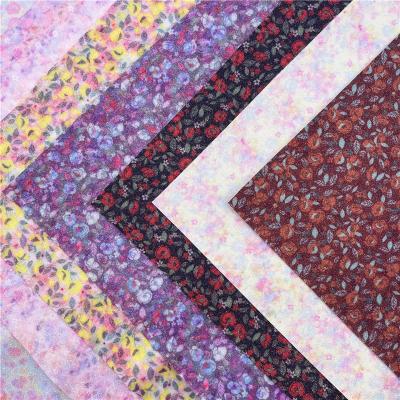 China Abrasion-Resistant Flower Glitter Printing Fabric For Making Bows Bags Product for sale